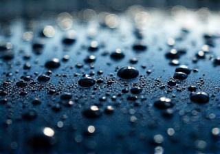 Water beading on a ceramic coated car